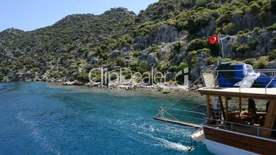 The sink city Kekova and yacht with tourists, Antalya, Turkey