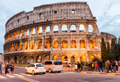 ROME - NOVEMBER 2, 2012: Tourists enjoy Colosseum at night. More