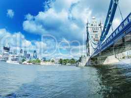 London. Tower Bridge and city skyline over Thames