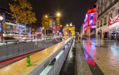 PARIS - DECEMBER 2, 2012: Lights of Champs Elysees at night. The