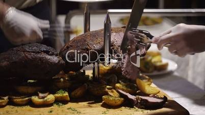 cutting delicious fillet of veal