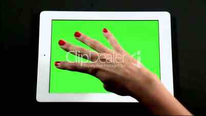 Tablet Computer Touch Screen Finger Gestures on Green