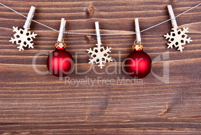 Christmas Decoration on a Line on Wood