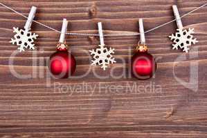 Christmas Decoration on a Line on Wood