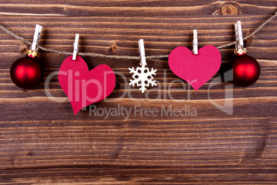 Empty Heart Tags and Christmas Decoration on a Label