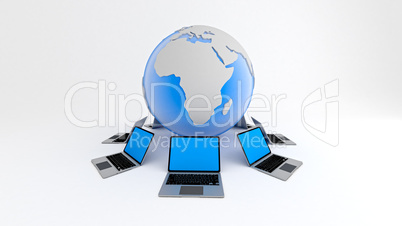 Laptops around globe. Global network concept.