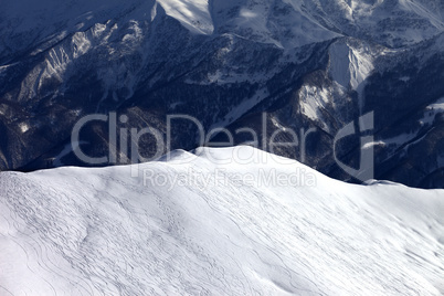 Top view on off piste slope in evening