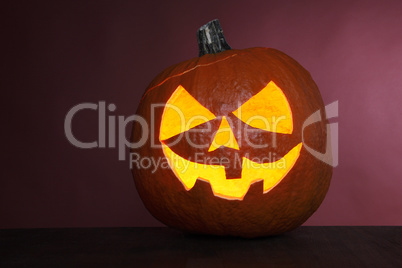 Pumpkin on red background for Halloween