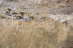 Excavator Tractors Moving Dirt