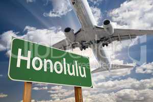 Honolulu Green Road Sign and Airplane Above