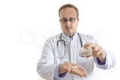 Young Doctor with bottle of Pills