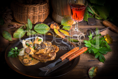 Steak with potato dumplings and forest mushroom sauce