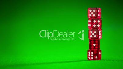 red dices on green cloth...