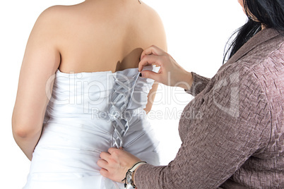 Image of bridesmade and bride's back