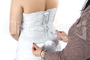 Photo of bridesmade and bride's back