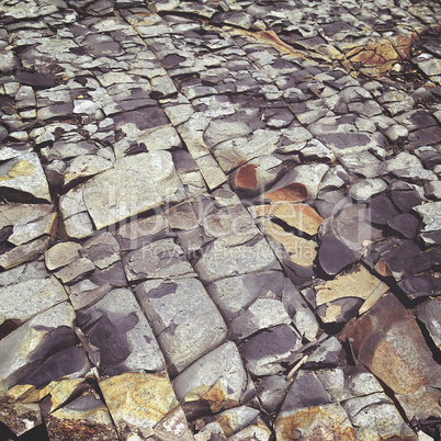 cracked stone rock in the style of grunge