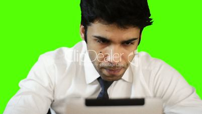 Young businessman using digital tablet