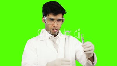 Male scientist experimenting in a laboratory