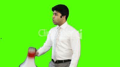 Young businessman talking into a megaphone