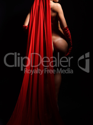 Nude woman behind the red cloth