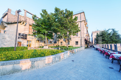 SAN MARINO - SEPTEMBER 8, 2014: Tourists walk along city streets