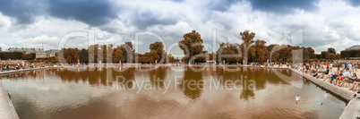 PARIS, FRANCE - MAY 27, 2014: Tourists relax in Bassin Octogonal