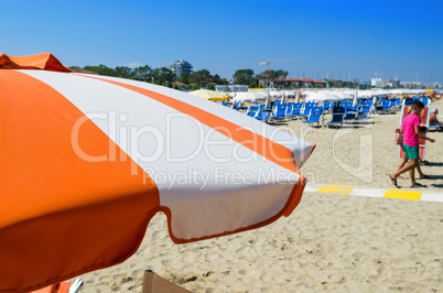 Colorful umbrellas on a sandy beach