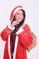Junge Weihnachtsfrau in Dessous mit Mantel und roter Mütze