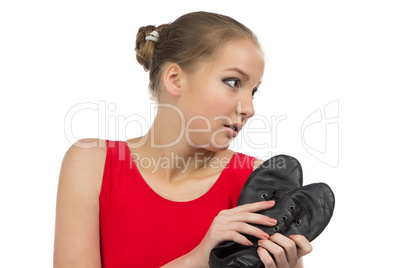 Young ballerina and ballet shoes