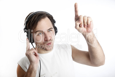 Attractive man with headphones in front of a white background da