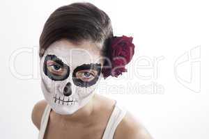 Woman with makeup of la Santa Muerte with red rose
