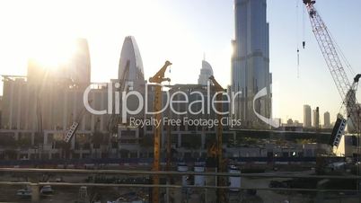 Modern city buildings with cranes, Dubai, United Arab Emirates