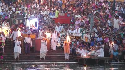 Pan shot of pilgrims at the ghats of Ganges River