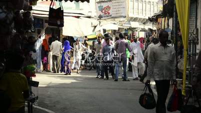 Locked-on shot of people in a market at Pushkar Fair