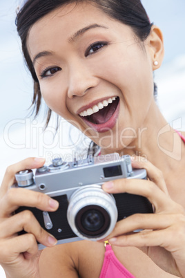 Chinese Asian Girl Woman at Beach Taking Photographs