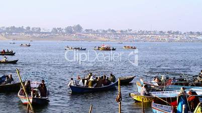 Locked-on shot boats in a river during Kumbh Mela