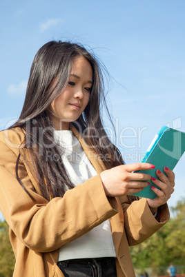 Young woman with mobile tablet PC