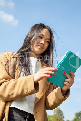 Young woman with mobile tablet PC