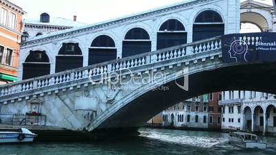 Tracking shot of a bridge over a canal