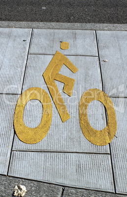Bicycle sign path on the pavement