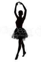 Silhouette of dancer girl with hands up