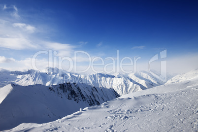 Snowy mountains at sun day