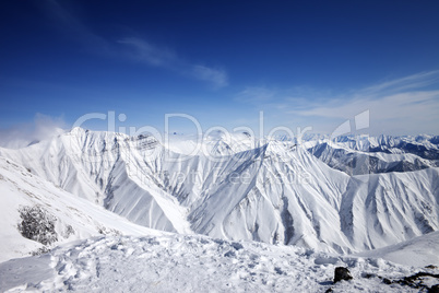 Snowy mountains at nice sun day