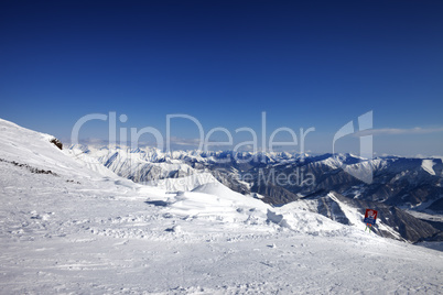 Off-piste slope and warning sign of avalanches