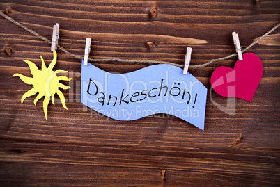 The German Word Dankeschön on a Purple Label