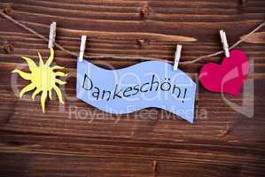 The German Word Dankeschön on a Purple Label