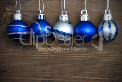 Five Decorated Christmas Balls in a Line