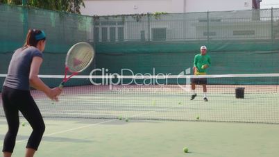 23of26 People, man and woman playing tennis, game, match, sports