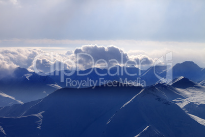 Silhouette of evening mountains in mist