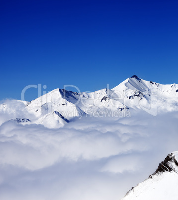 Mountains in clouds at nice day